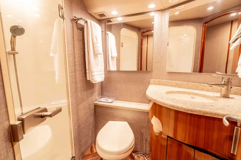 Slide: The Image of Luxurious bathroom in 2014 Viking 46 Convertible yacht with modern fixtures and elegant design. - 31