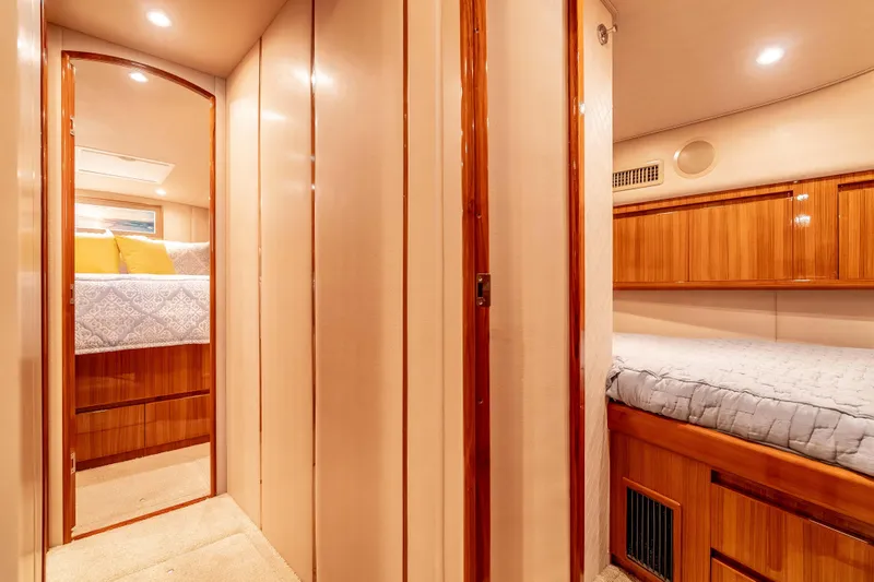 Slide: The Image of Luxurious interior of 2014 Viking 46 Convertible yacht with cozy bedrooms and elegant wood finishes. - 32