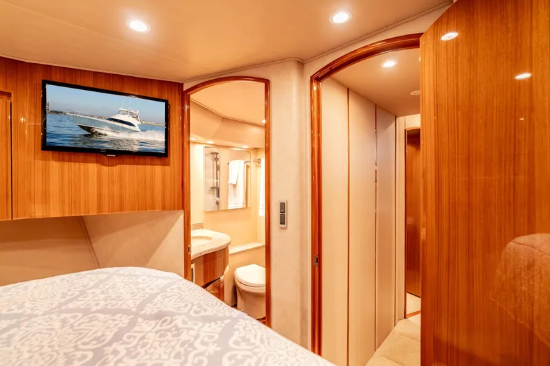 Slide: The Image of Luxurious interior of 2014 Viking 46 Convertible yacht with wood finishes and modern amenities. - 34