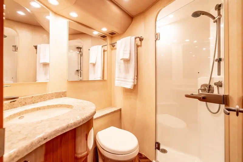 Slide: The Image of Luxurious bathroom in 2014 Viking 46 Convertible yacht with shower and elegant fixtures. - 35