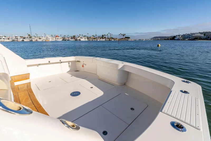 Slide: The Image of Spacious deck of 2014 Viking 46 Convertible yacht on calm water. - 9