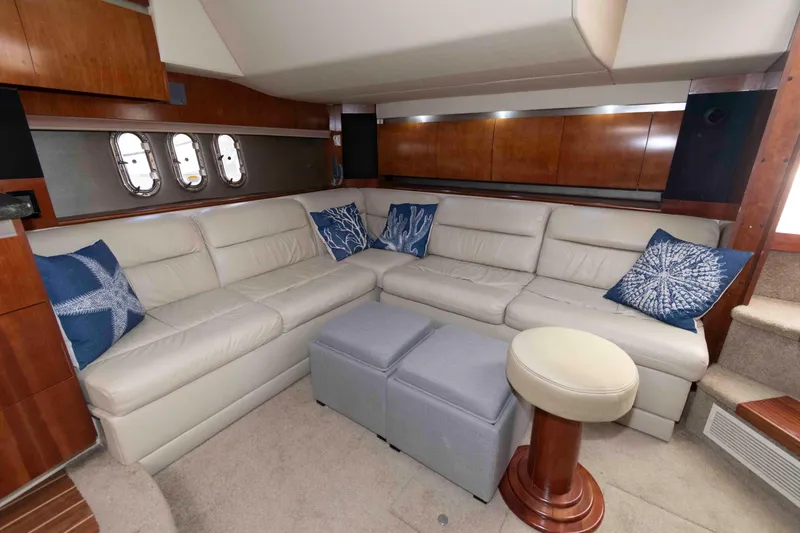 Slide: The Image of Luxurious 2007 Cruisers Yachts 420 Express interior with plush seating and nautical decor. - 11
