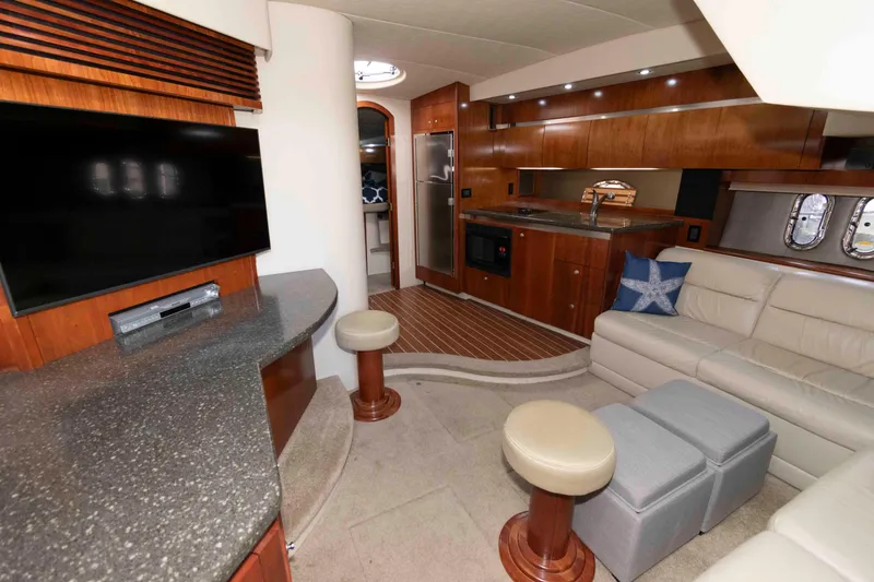Slide: The Image of Luxurious interior of 2007 Cruisers Yachts 420 Express with modern amenities and elegant design. - 13
