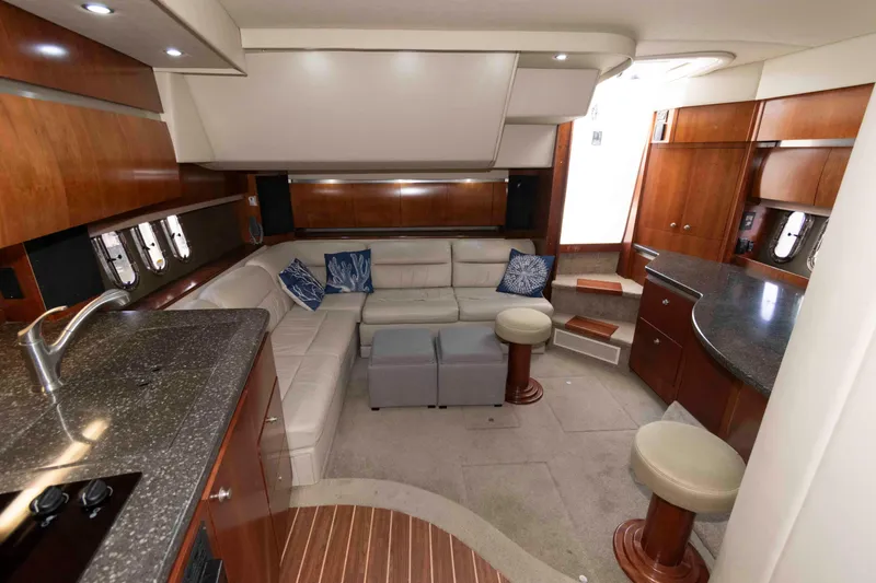 Slide: The Image of Luxurious interior of 2007 Cruisers Yachts 420 Express with elegant seating and modern amenities. - 14