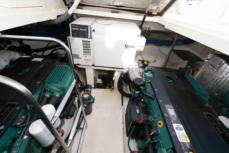 Slide: The Image of Engine room of 2007 Cruisers Yachts 420 Express with Onan Marine generator. - 17