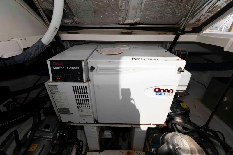 Slide: The Image of Engine room of 2007 Cruisers Yachts 420 Express with Onan marine generator. - 22