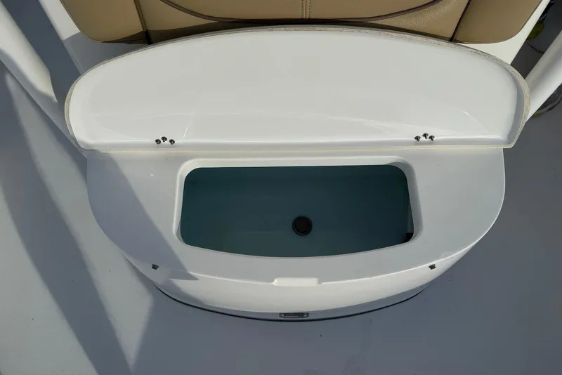 Slide: The Image of Open storage compartment on a 2015 Sportsman Masters 247 Bay Boat. - 13