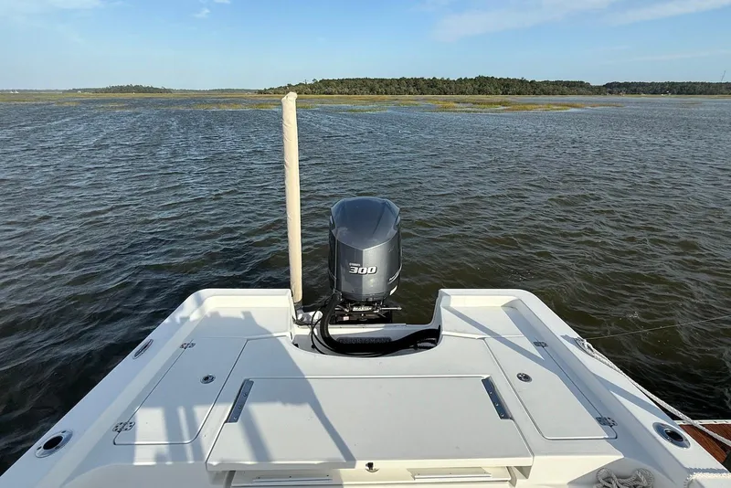 Slide: The Image of 2015 Sportsman Masters 247 Bay Boat on water, featuring a powerful 300 engine. - 15