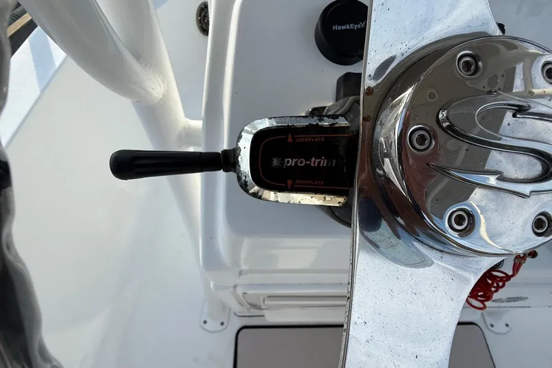 Slide: The Image of 2015 Sportsman Masters 247 Bay Boat steering wheel and control lever detail. - 21