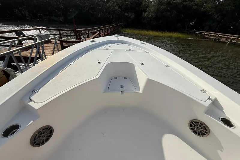 Slide: The Image of 2015 Sportsman Masters 247 Bay Boat bow view at dockside. - 7