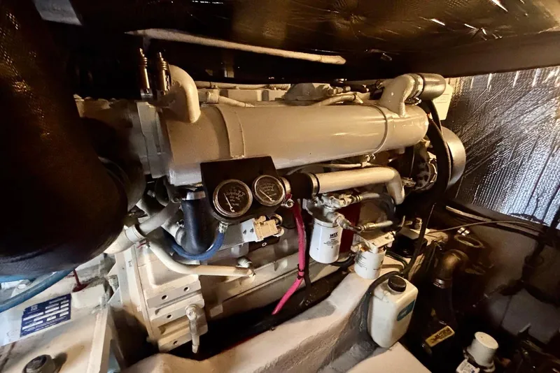 Slide: The Image of Luxurious 2005 Sea Ray 420 Sedan Bridge yacht interior with modern kitchen amenities. - 20