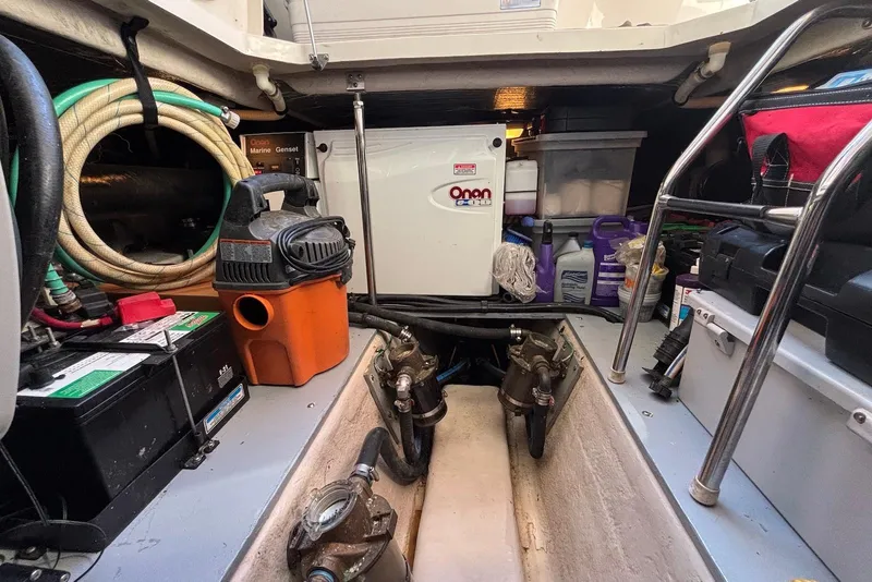 Slide: The Image of Engine room of 2005 Sea Ray 420 Sedan Bridge with Onan generator and maintenance tools. - 29