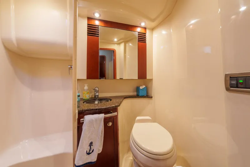 Slide: The Image of Luxurious bathroom in 2005 Sea Ray 420 Sedan Bridge yacht, featuring modern amenities. - 31
