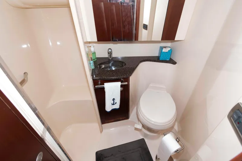 Slide: The Image of Luxurious bathroom in 2005 Sea Ray 420 Sedan Bridge yacht with modern amenities. - 33