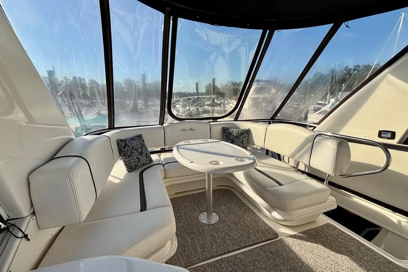 Slide: The Image of 2005 Sea Ray 420 Sedan Bridge yacht interior with stairs and sliding glass door. - 6