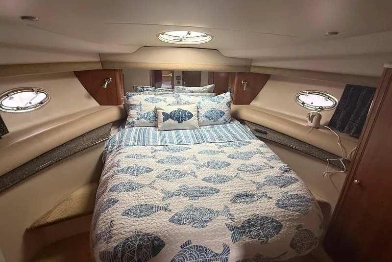 Slide: The Image of Cockpit of 2004 Meridian 408 Motoryacht with wood accents and steering wheel. - 10