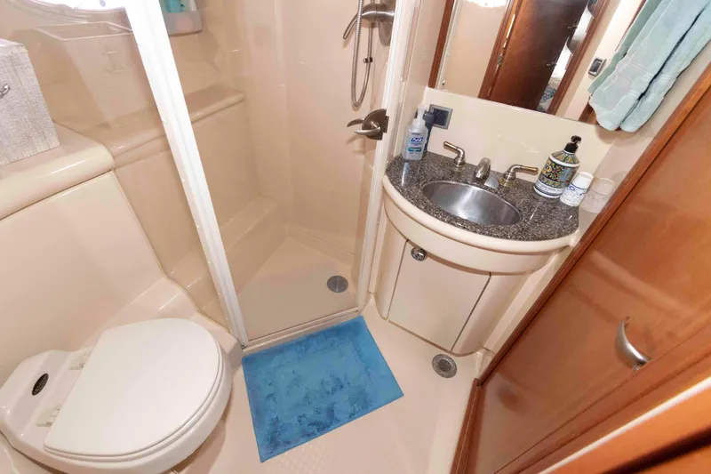 Slide: The Image of Bathroom in 2004 Meridian 408 Motoryacht with shower, sink, and toilet. - 22
