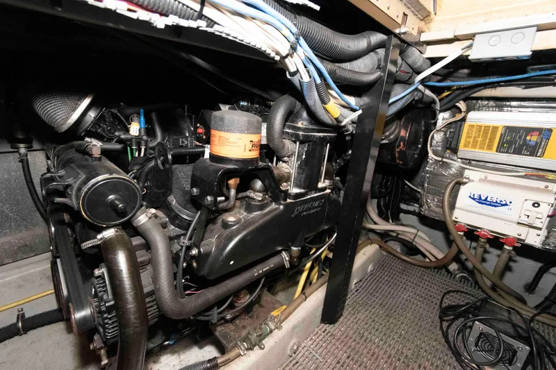 Slide: The Image of Engine room of 2004 Meridian 408 Motoryacht with visible wiring and components. - 24