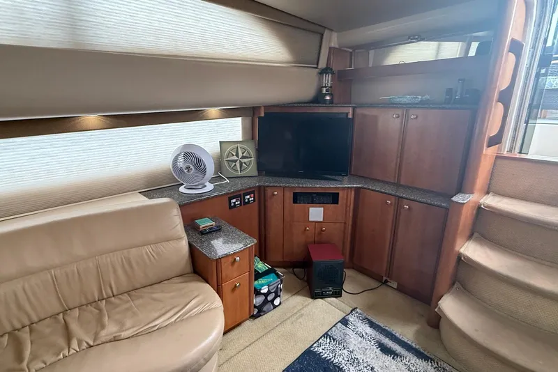 Slide: The Image of Luxurious interior of 2004 Meridian 408 Motoryacht with plush seating and nautical decor. - 6