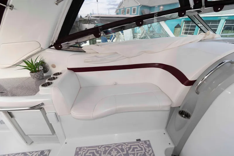 Slide: The Image of 2008 Formula 31 Performance Cruiser interior with white seating and modern design elements. - 10