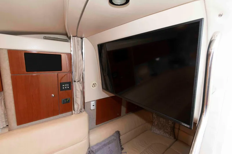 Slide: The Image of Interior of 2008 Formula 31 Performance Cruiser with TV and wooden cabinetry. - 17