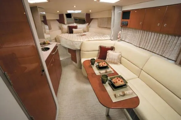 Slide: The Image of 2008 Formula 31 Performance Cruiser docked at marina with American flag. - 3