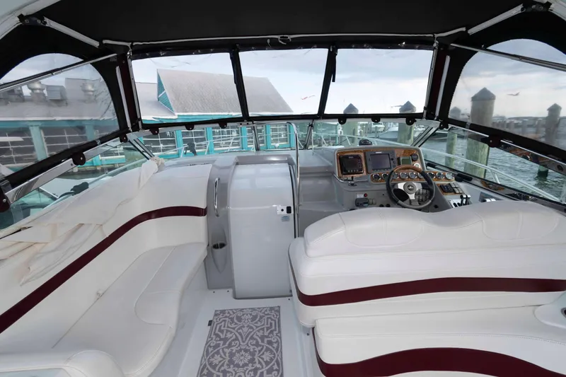 Slide: The Image of 2008 Formula 31 Performance Cruiser interior with white seating and modern dashboard. - 6