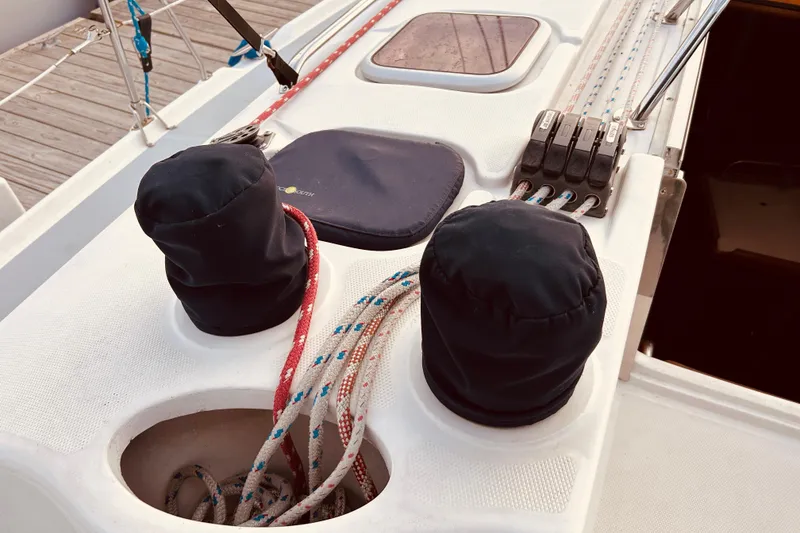 Slide: The Image of Deck of 2003 Hunter 386 sailboat with winches and ropes. - 10