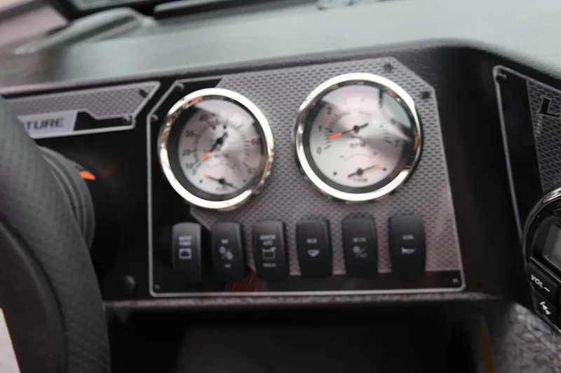 Slide: The Image of Dashboard of 2026 Lund 1775 Adventure Sport boat with gauges and controls. - 30