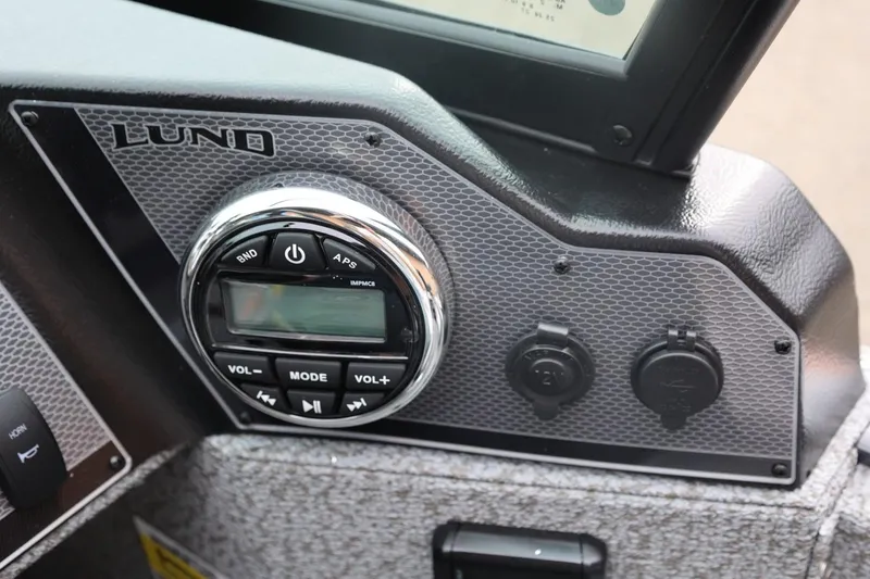 Slide: The Image of Dashboard of 2026 Lund 1775 Adventure Sport boat with control panel and audio system. - 31