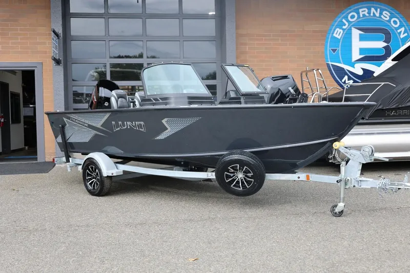 Slide: The Image of 2026 Lund 1775 Adventure Sport boat on trailer outside Bjornson Marine. - 4