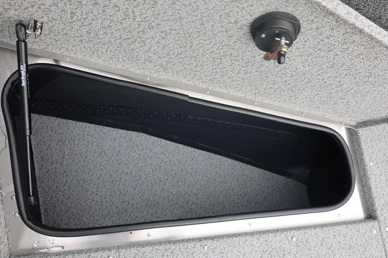 Slide: The Image of 2026 Lund 1775 Adventure Sport boat storage compartment with hydraulic lift. - 40