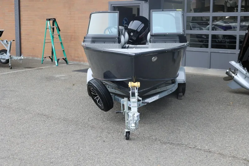 Slide: The Image of 2026 Lund 1775 Adventure Sport boat on trailer in outdoor setting. - 5