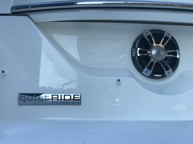 Slide: The Image of 2019 Sea Ray 310 SLX boat with Quiet Ride technology and Fusion speaker. - 26