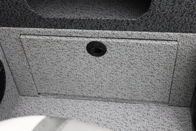 Slide: The Image of 2026 Lund 1875 Impact XS Sport storage compartment with textured finish. - 30