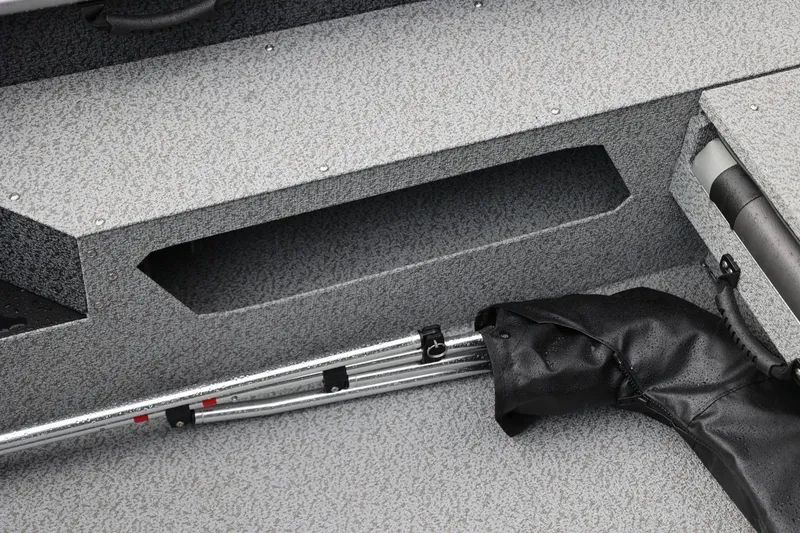 Slide: The Image of Interior of 2026 Lund 1875 Impact XS Sport boat with storage compartment and equipment. - 39