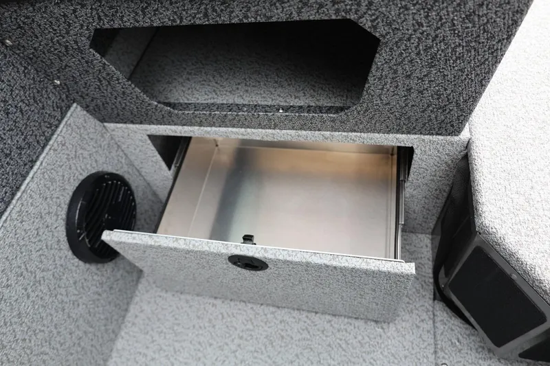 Slide: The Image of 2026 Lund 1875 Impact XS Sport boat storage compartment with open drawer. - 41