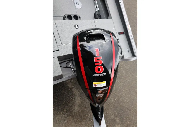 Slide: The Image of 2026 Lund 1875 Impact XS Sport with Mercury 150 Pro outboard motor. - 59