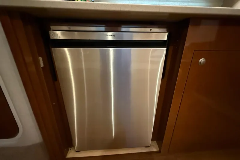 Slide: The Image of Stainless steel refrigerator in 2009 Sea Ray 350 Sundancer yacht kitchen. - 16