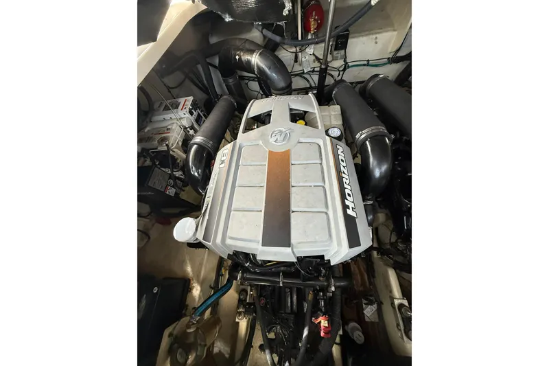 Slide: The Image of Engine compartment of a 2009 Sea Ray 350 Sundancer boat. - 22