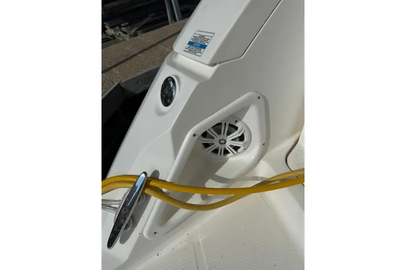 Slide: The Image of 2009 Sea Ray 350 Sundancer boat detail with speaker and yellow rope. - 7