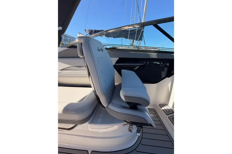 Slide: The Image of 2024 Sea Ray SLX 260 boat interior with luxurious seating and sleek design. - 20