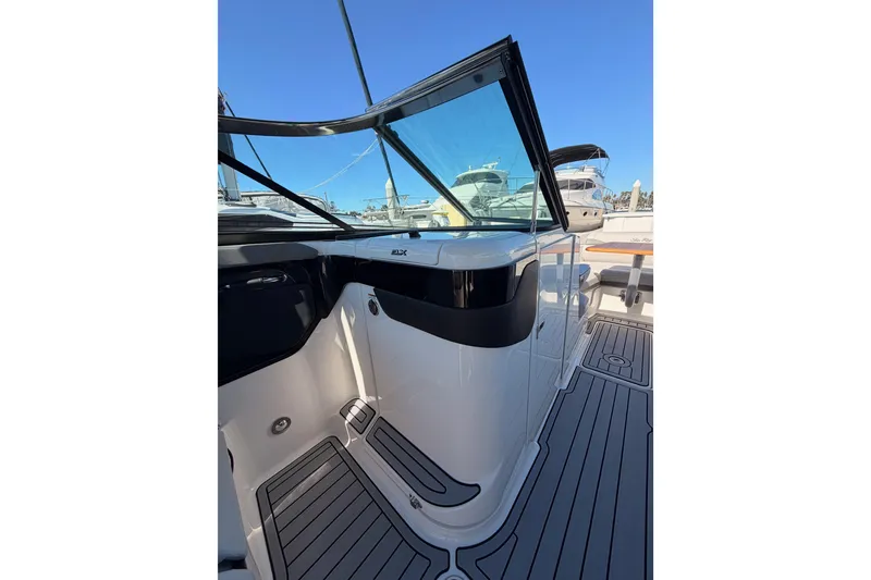 Slide: The Image of 2024 Sea Ray SLX 260 boat interior with sleek design and modern features. - 21