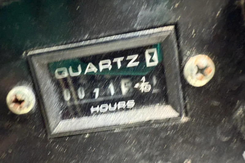 Slide: The Image of Hour meter reading 71.6 hours on 2005 Rinker Fiesta Vee 300 boat. - 26