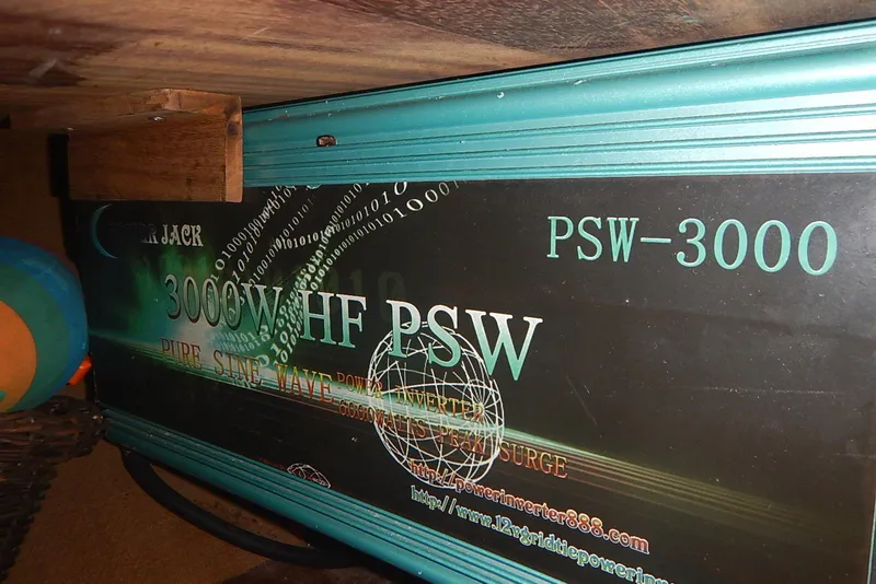 Slide: The Image of Power inverter PSW-3000, 3000W HF, pure sine wave, under wooden shelf. - 16