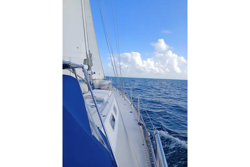 Slide: The Image of Sailing on a 1978 Pearson 424 yacht, open sea and clear sky. - 3