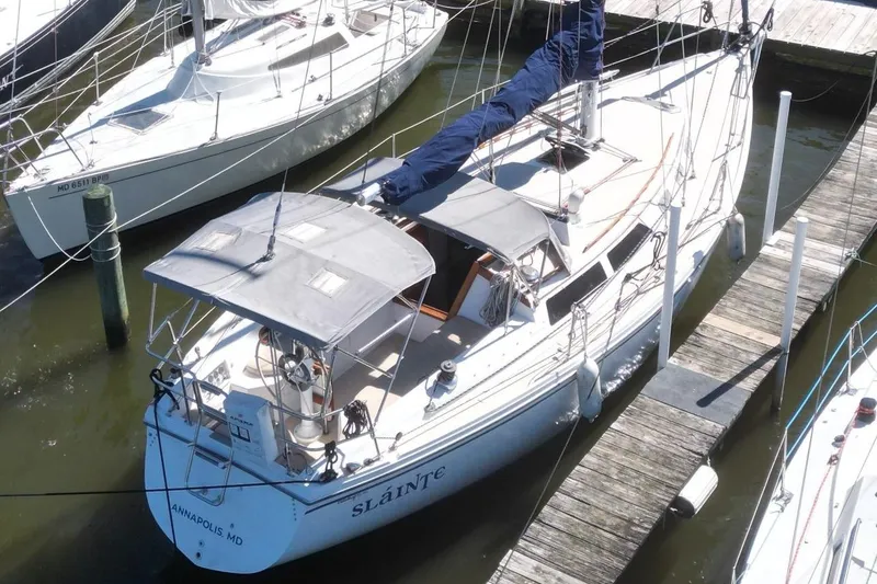 Slide: The Image of 1988 Catalina 34 sailboat docked in Annapolis, Maryland marina. - 6