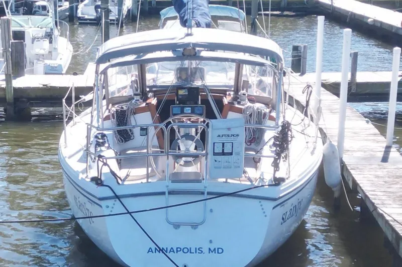 Slide: The Image of 1988 Catalina 34 sailboat docked in Annapolis, MD marina. - 8