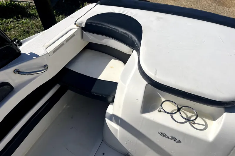 Slide: The Image of Interior view of a 2012 Sea Ray 205 Sport boat with seating and cup holders. - 6