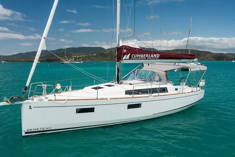 The Image of Beneteau Oceanis 38.1 sailboat docked at marina, 2017 model, with blue canopy. - 1